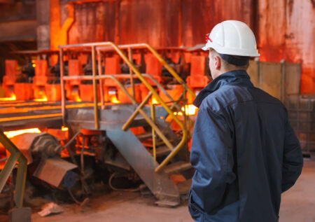 Steelworker recruiting candidate in a steel plant